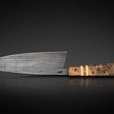 My seven inch chef knife  River Pattern Damascus is diffusion bonded by me from 26C3 and 15N20 Steels. Handle is made from Javanese Starfruit Burl with a pure white American Holly accent.