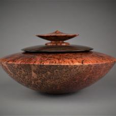 Large contemporary Jarrah hollowed out vessel with Ziricote hollowed out center Disc Set Box and Jarrah lid.