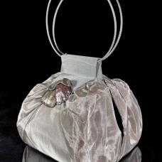 Evening Handbag made of very fine  silk like stainless steel mesh with layer of copper mesh beneath. Handles of aircraft cable.