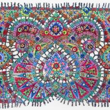 Colorful geometric pieces connected and embellished with thread, the center being an upsidedown heart. 