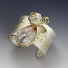 scenery that has the feeling of the Chinese traditional landscape painting by using the solid forms and the wire structure. 22 k &amp;amp; 18k gold  sterling silver  quartz  diamonds