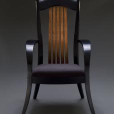 dark Occasional chair  with lighter back slats and dark upholstered seat. 