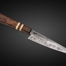 Another Petty (Utility) knife  this one in Damascus that I diffusion bonded from 26C3 and 15N20 steels. The handle is Turkish Walnut with American Aspen accents.
