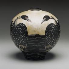 earthenware vessel depicting two mirrored birds