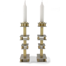Hand fabricated from pewter and brass these stunning candle holders bring a delicate elegance to your dinner table.