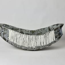 highly textured slight u-shaped vessel.