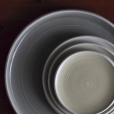 Stack of wheel thrown plates