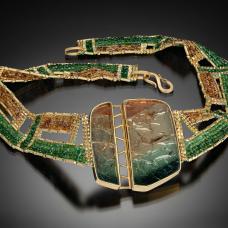 Hand woven collar with multicolor tourmaline and 20k gold beads. Hand fabricated bezel with 22k gold  set with two matching tourmaline slices.