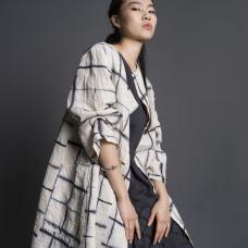Hand-dyed shibori using sustainable dyes and linen. Stitched  hand-patterned  hand-cut. Worn with agekubi tunic.