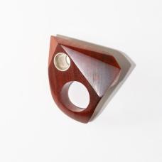 Hand Shaped and polished Pink Ivory wood with silver tubing riveted through the design.