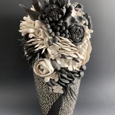 black and white porcelain vase with porcelain flower arrangement, 