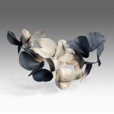 Made of sterling silver. Hammered  oxidized and constructed.