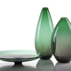 The Double Ombre Series was created using large forms to explore with blended colors. Like a painting  or a horizon line  this series uses flattened forms to play with the interaction of two colors.