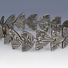 House made Damascus steel linked w/ 18K gold and hand made clasp