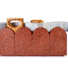 The River is part of Our Nerikomi wood series and is the third rendition of the Nerikomi Sideboard with Plinths. The terra cotta dyed Nerikomi Sideboard is made from our Nerikomi wood material that we create from reclaimed scrap plywood saved from various cabinet shops.