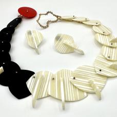 Fused  carved  and sewn glass with glass seed beads