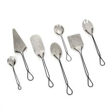 The Foliage Wares Serving Set include a variety of spoons  spatulas  and cake and pie servers. Dimensions vary  with the largest pieces measuring 3&amp;quot; wide x 14&amp;quot; long. Shown with photo-etch fern motifs on tinned brass with blackened stainless handles  attached with German silver rivets.