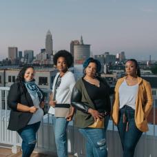 The models are wearing our tri-pocket cardigans  paired with our minimal crossbody bags and triangle scarf.