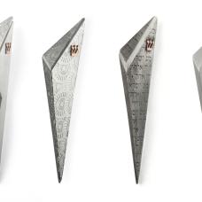 An abstract design for a more contemporary taste.These Mezuzahs have been made from fabricated pewter with copper shins.