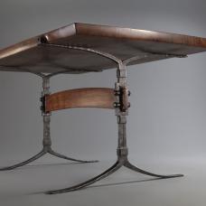 table with forged iron legs and wood top