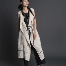 Hand-dyed itajime shibori using sustainable dyes and linen. Deconstructed  hand-cut  pieced  stitched. Hand-patterned. Worn with Cocoon Jinbaori.