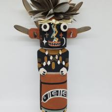 Carved from cottonwood root  painted with natural earth pigment paints. Other materials used  duck  quail feathers and yucca plant.