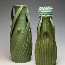 two plant-like earthenware clay vase.