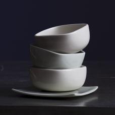 stack of three bowls with subtle rouded square shape
