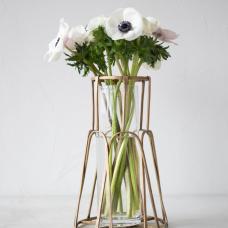 This basket vase features a woven design made from forged brass. It can be used to elevate a bouquet of fresh flowers  or simply as a one-of-a-kind artistic piece. A glass cylinder is also included.