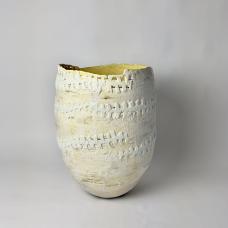 yellow and white vase with textured matte finish