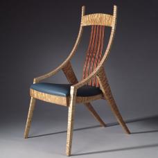 Occasional Chair with Floating Back Quilted maple with dark leather seat and back slats