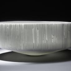 carved and slightly translucent porcelain vessel 