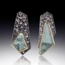 two asymmetric earrings