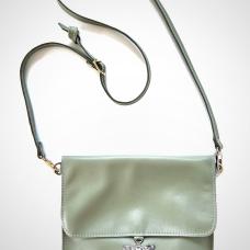 green leather purse with silver bee button